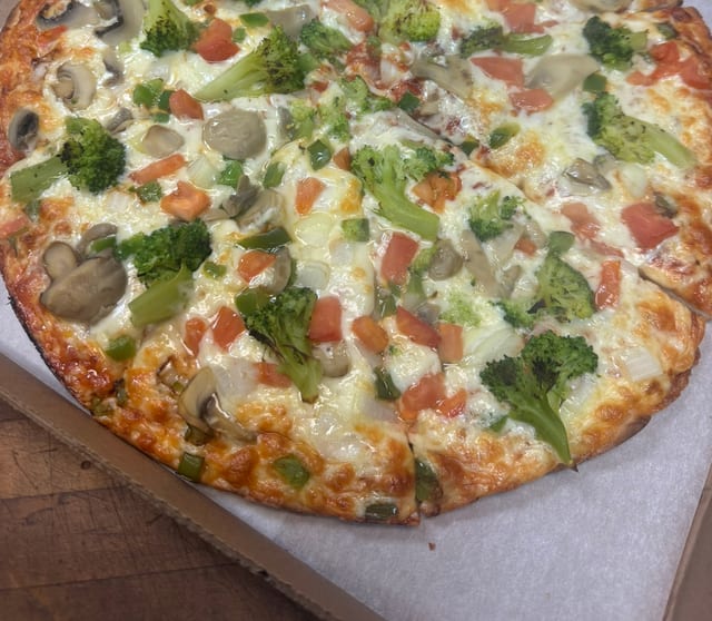 Veggie Gourmet Pizza.